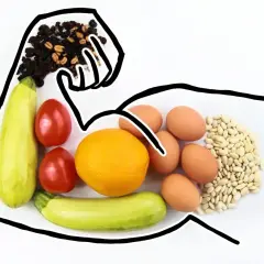 Zdrowa dieta to klucz do tego, jak podbic testosteron. Na talerzu: cukinia, pomidory, pomarańcza, jajka, fasola i bakalie.